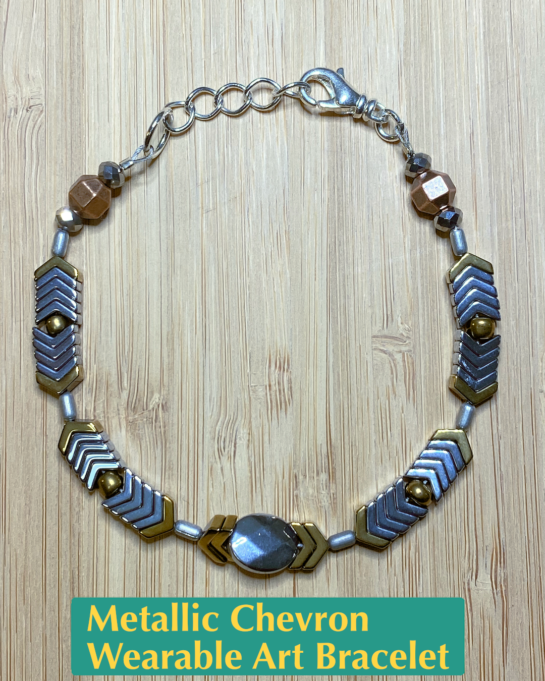 Handmade, wearable art brown, gold, and silver bracelet made of hematite, metal, and salvaged beads