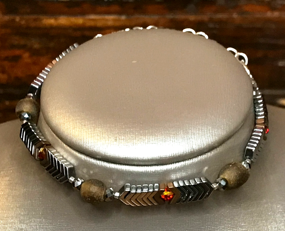Handmade bracelet as wearable art using recycled glass beads 