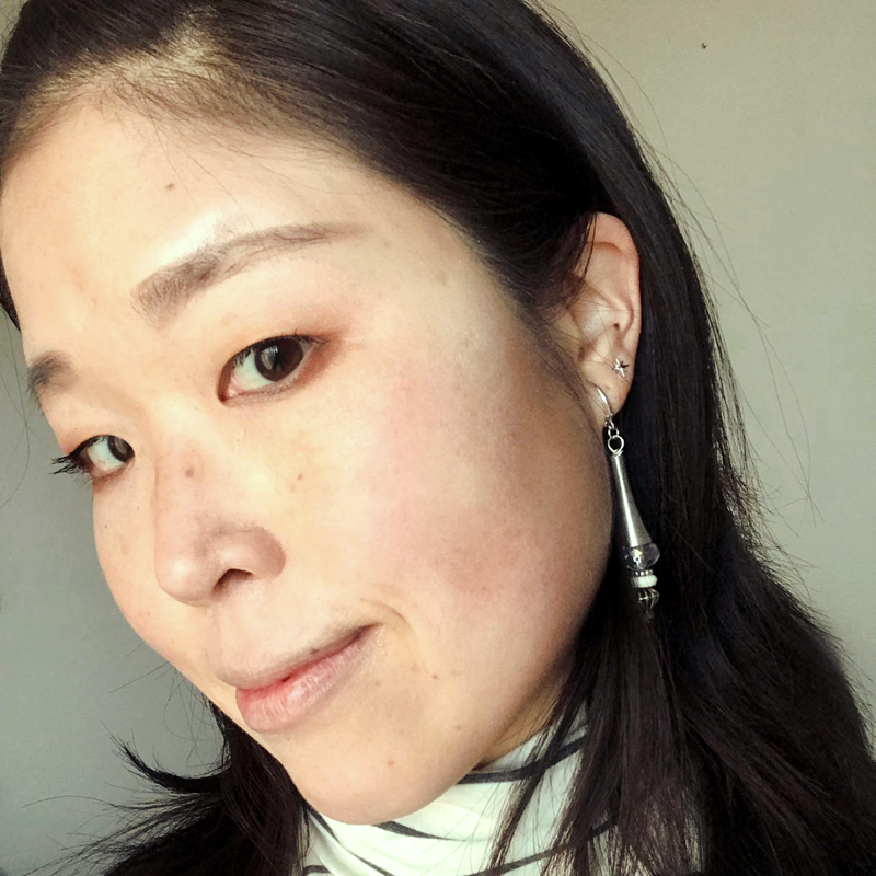Photo of Yuki Shimizu, the first customer to buy Salvage & Shine's Malian Monochrome earrings